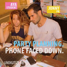 Party Planning. Phone Faced Down.