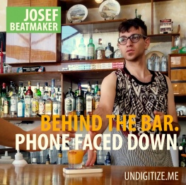 Behind The Bar. Phone Faced Down