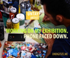 Working On My Exhibition. Phone Faced Down.